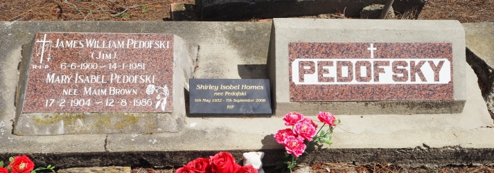 Wide shot of 
three Pedofski plaques, James and Mary, Shirley Holmes and a general Pedofsky plaque.