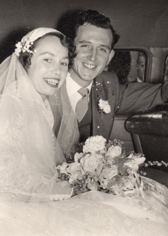 Henia and 
George in the wedding car