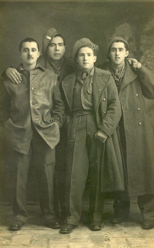 Studio 
photograph of Bronisław Bojanowski with three Polish soldiers, standing, relaxed.