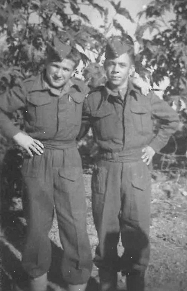 Bronisław 
Bojanowski with his arm around another Polish soldier's shoulder