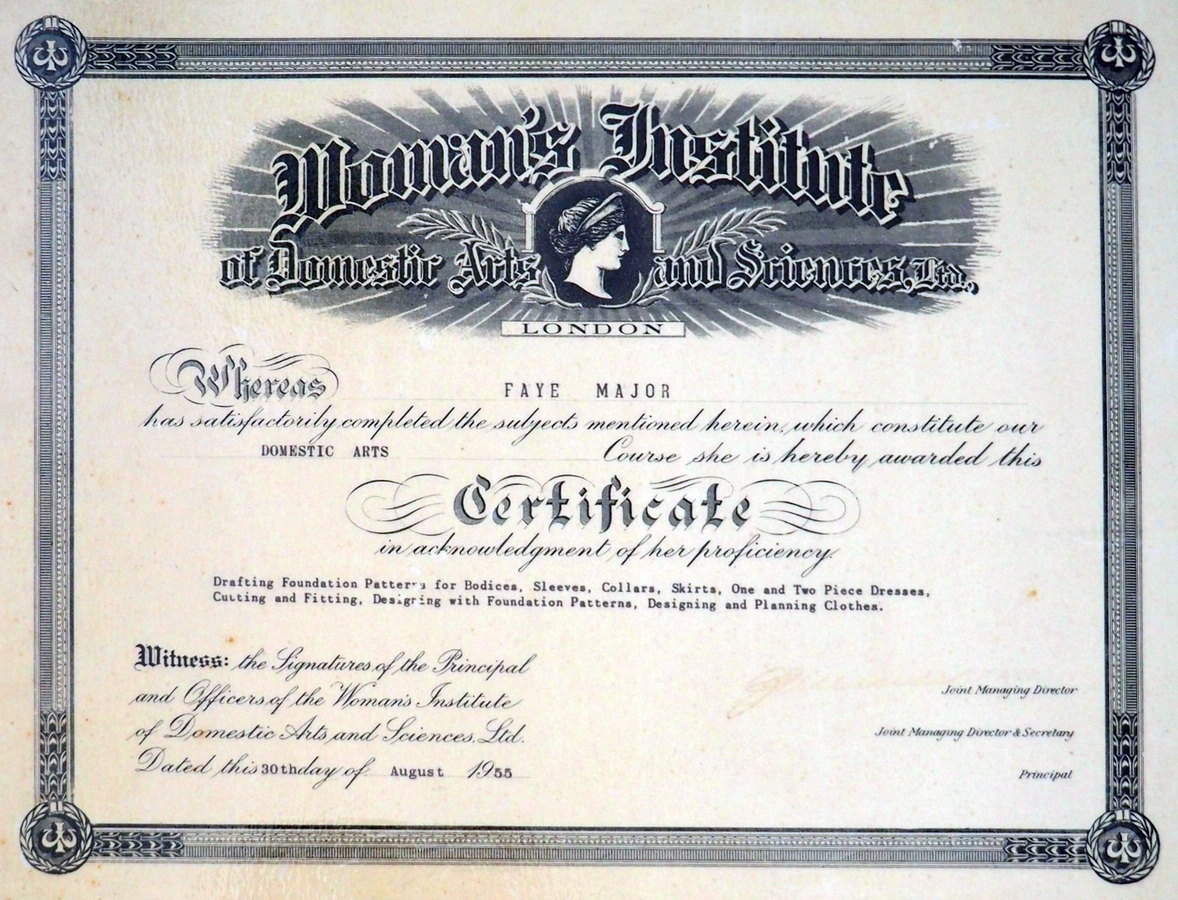 The 
   certificate has a printed frame and a side-on head shot of a woman in the middle of an intricate heading.