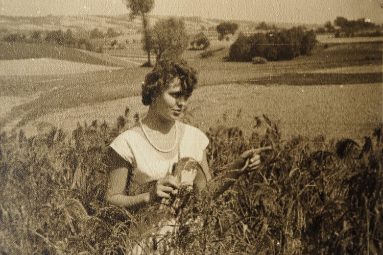 Eleonora Wojtyga 
as a young woman in a field at her parents' farm