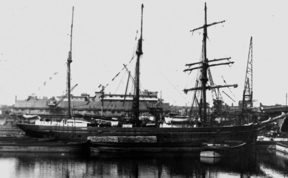 A black and white 
pic of the Friedeburg in Hamburg harbour, sails down