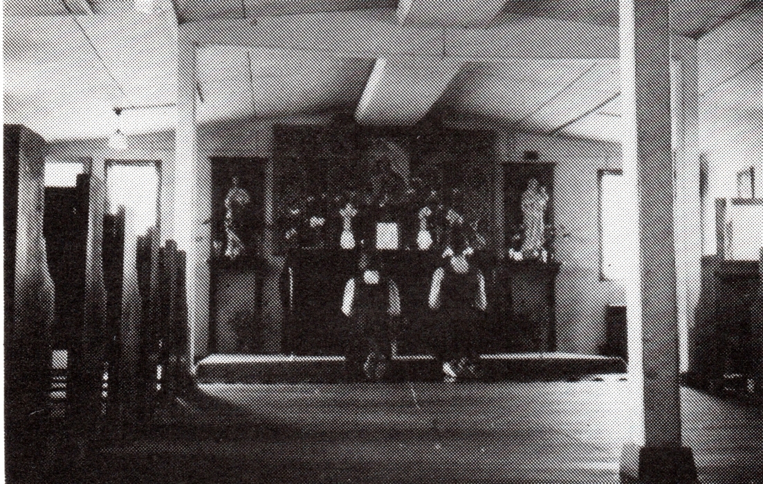 black and white pic 
   of a two girls kneeling at an altar