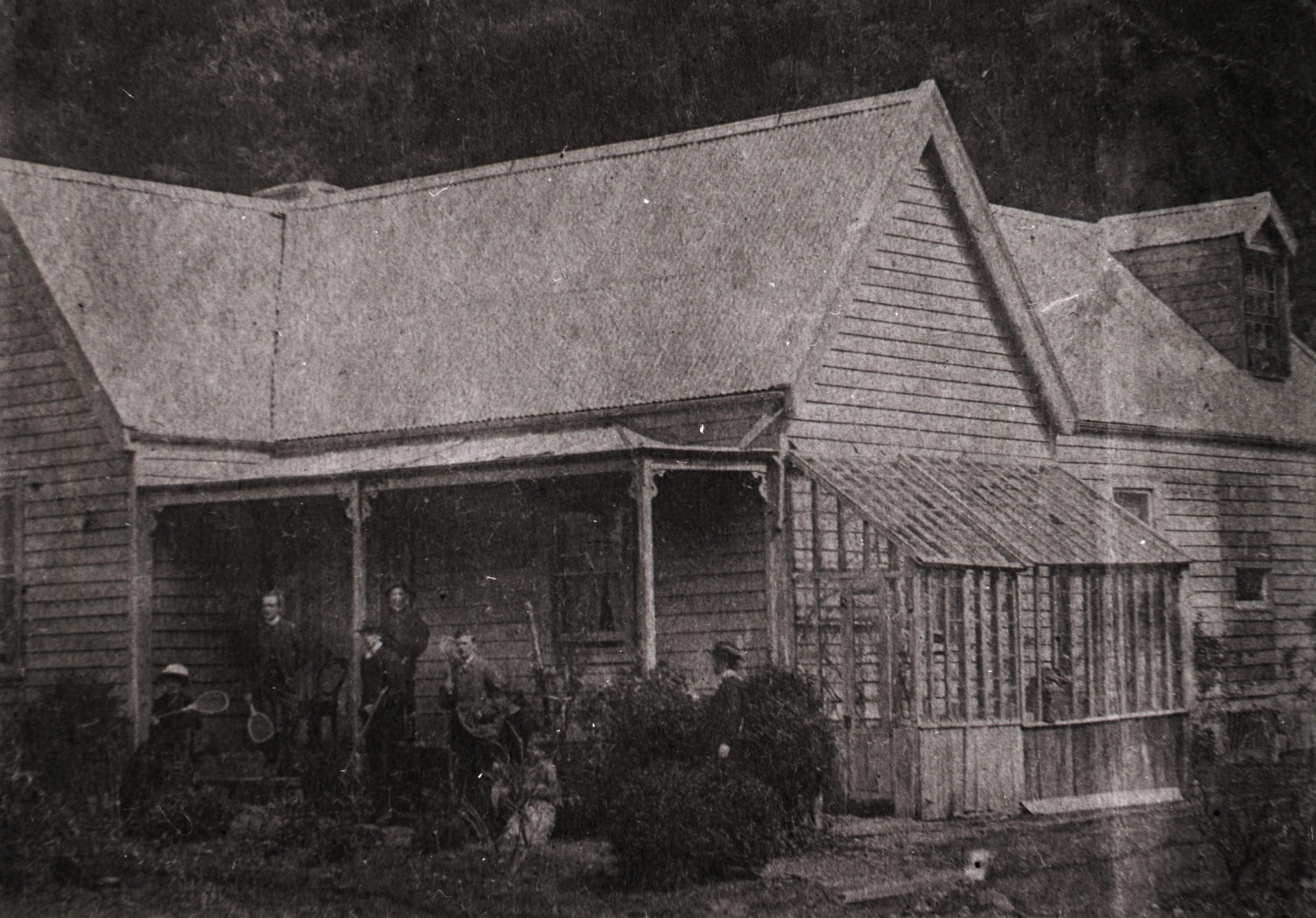 Macfarlane family 
group on the veranda of the house above