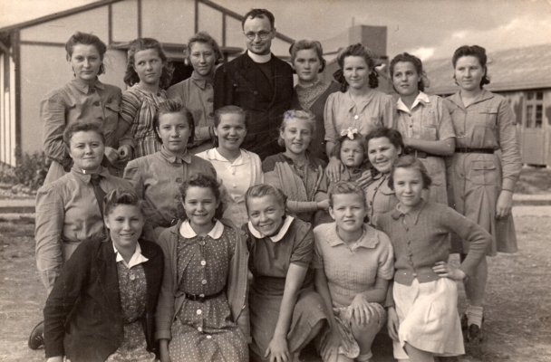 Pahiatua's 
chaplain among some of the girls.