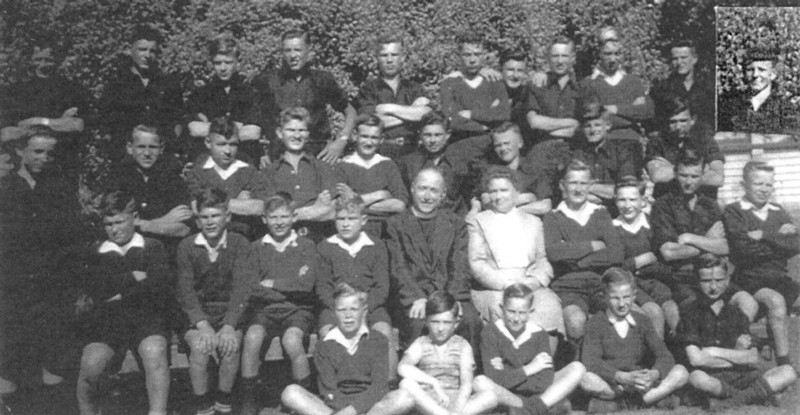 Group photograph of 
Hawera pupils with probably Mr and Mrs Tietze and a priest.