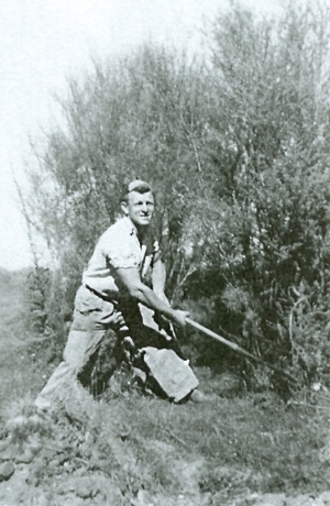 Joe with an axe 
scrub-cutting.