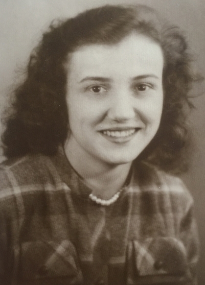 Head and 
shoulders shot of Joanna Adamek in England in her early 20s.