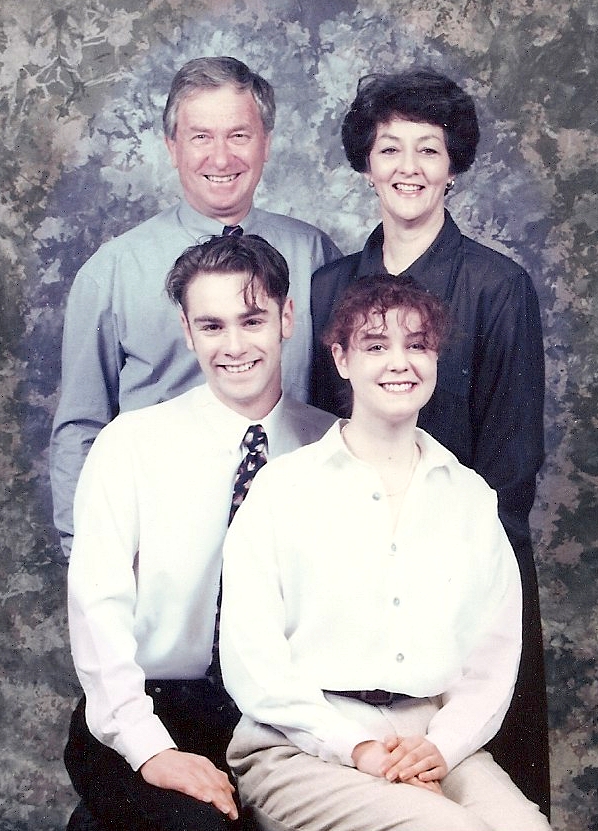 Studio 
shot of the family. Kazik and Jan staning behind Justin and Rachel.