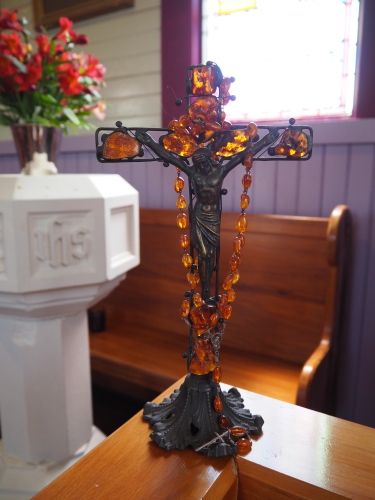 A church crucifix with the 
Polish amber rosary beads