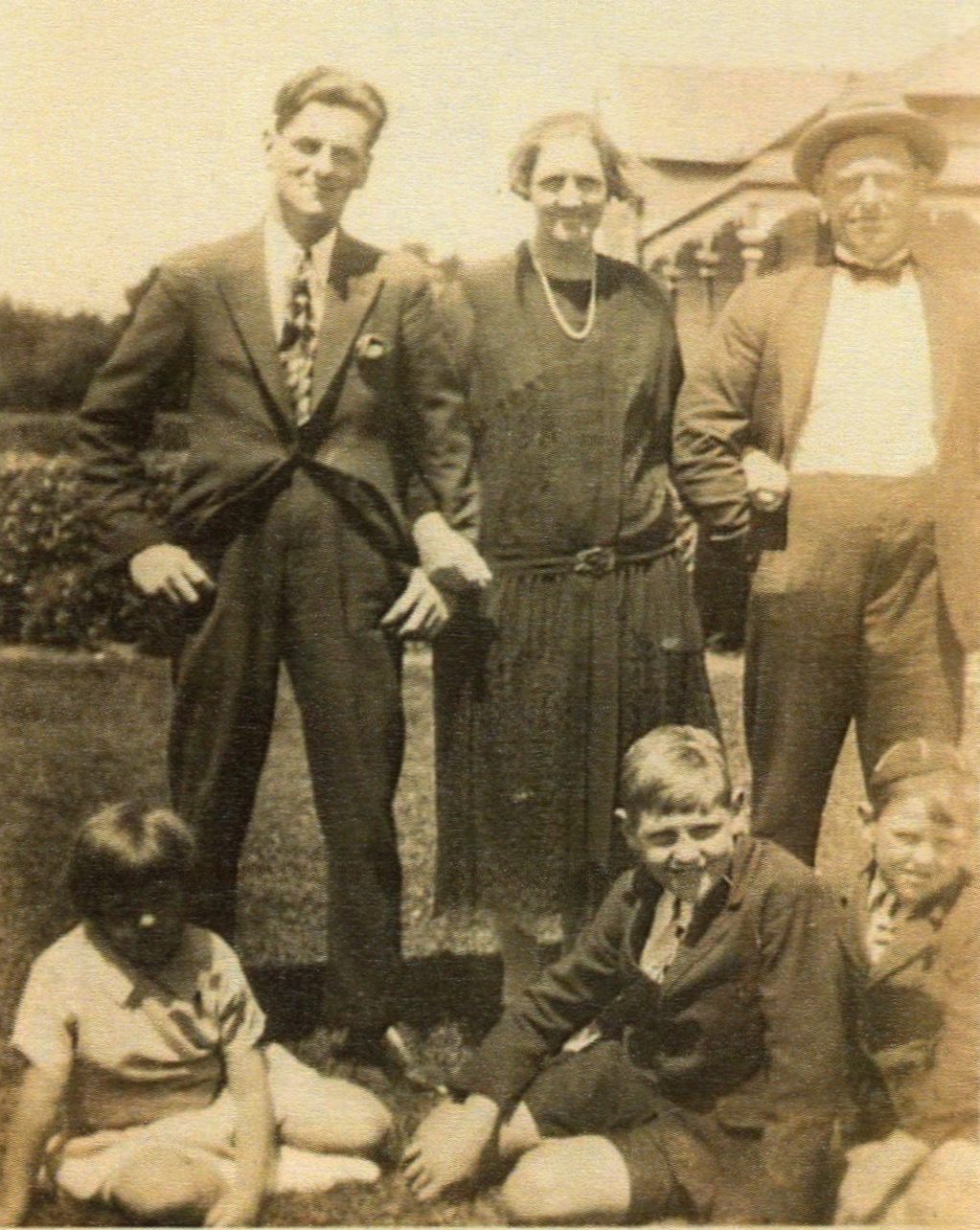 Michael with 
his children in the garden.