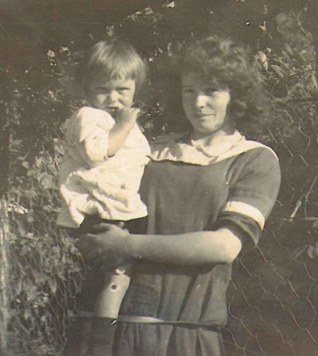 Lillian Ryan 
holding her baby sister, Myra.