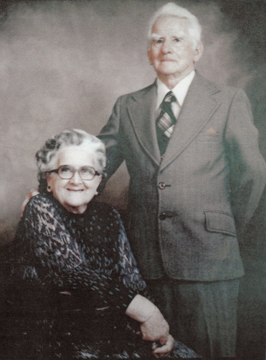 Studio 
photograph of Thomas, standing, and Nancy, sitting