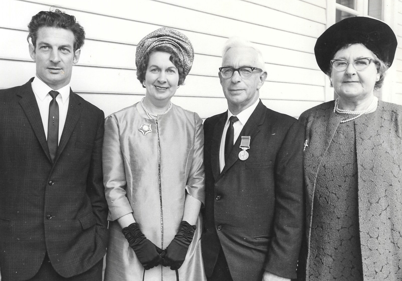 Jack and Edith Luskie with 
their adult children after the BEM ceremony