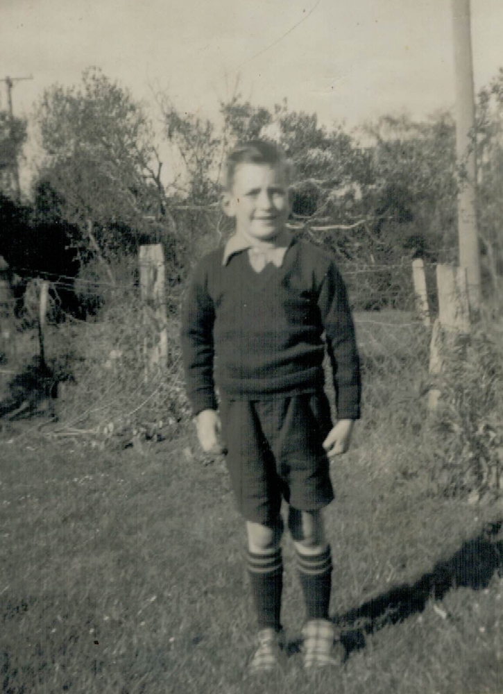 Kenneth Luskie as a boy 
in the farm garden