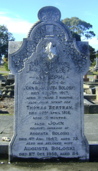 Headstone 
of John and Augusta Boloski, and their sons John and Joseph Thomas