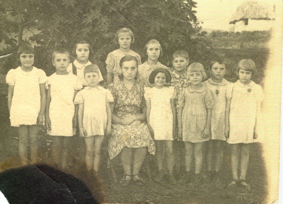 Group of  
girls with caregiver at the Tengeru orphanage