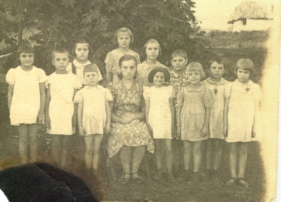 Group of  
girls with caregiver at the Tengeru orphanage