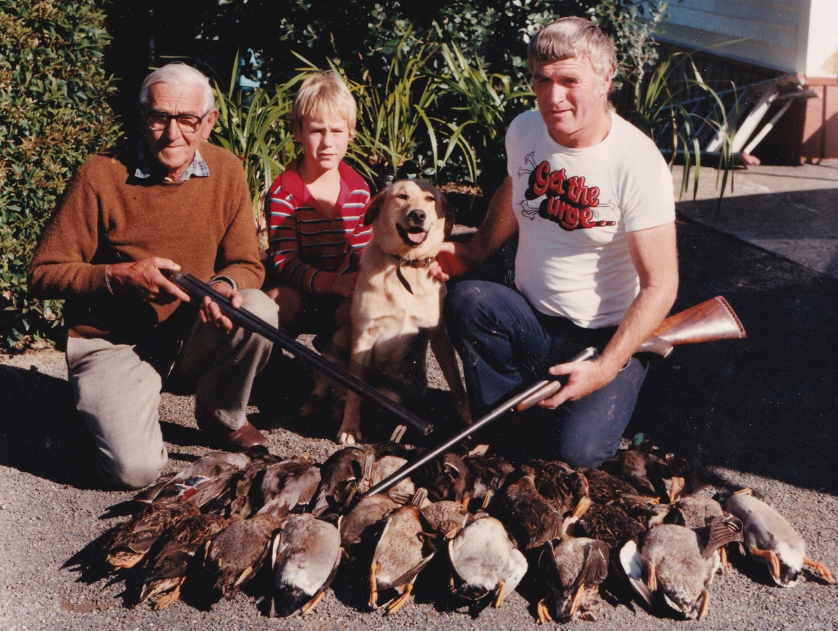 The two men again with young Nigel 
   in the middle, behind thier haul of ducks