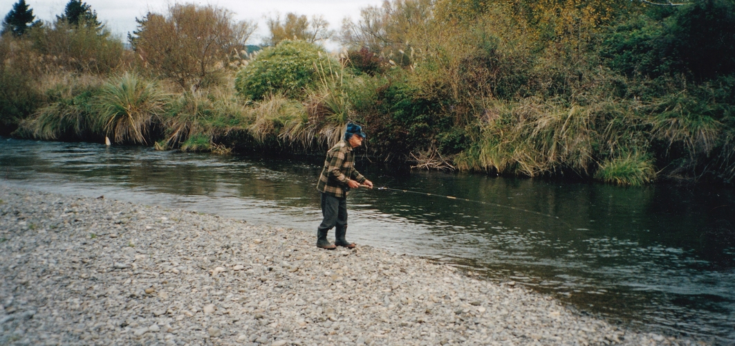 A casual shot of Ben fishing off the banks of the Tauranga-Taupo river