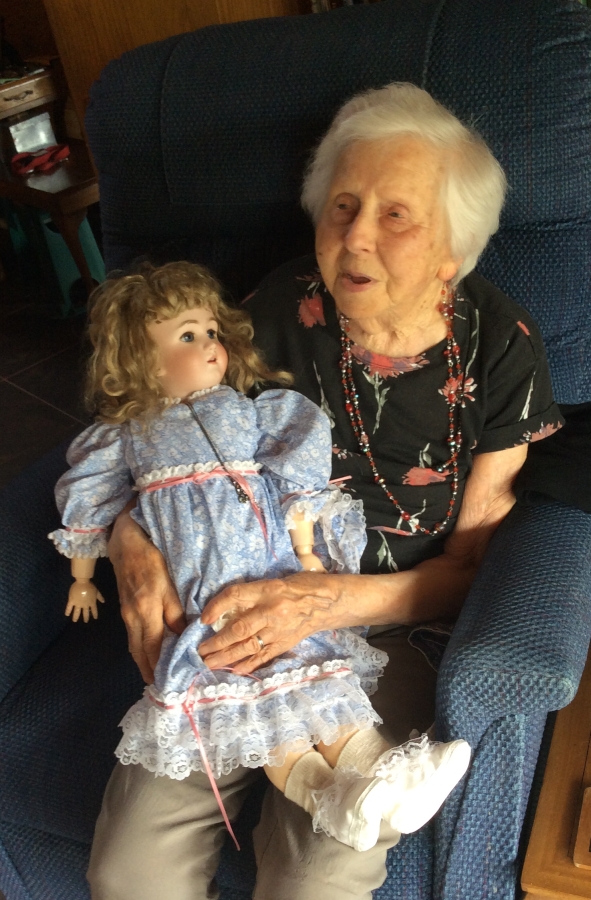 Madeline Anderson 
with doll