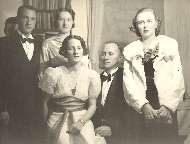 Madeline, 
right, with friends in evening attire