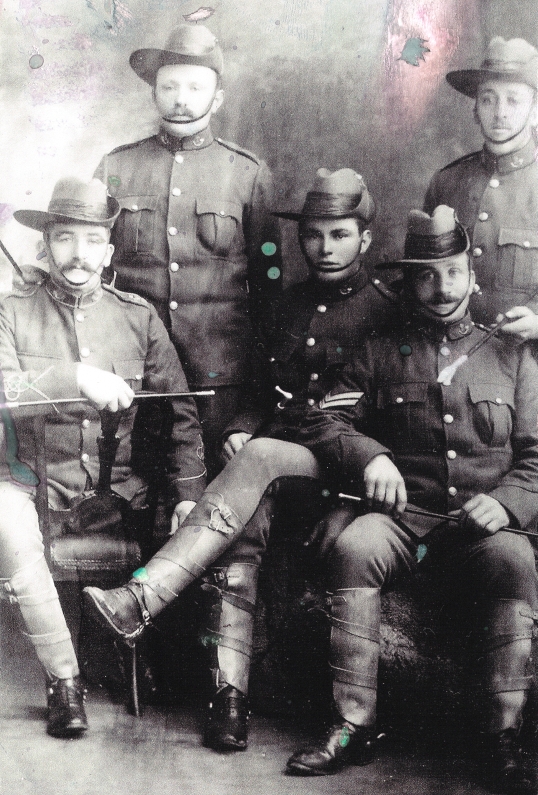 John Orlowski with four other men dressed in NZ army uniform used in the Boer War