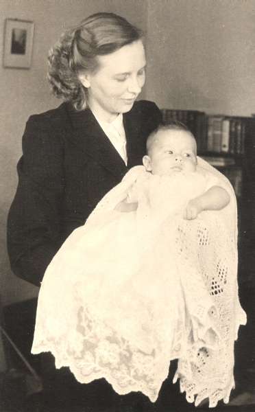 Madeline with 
her son, Brian, at his Christening