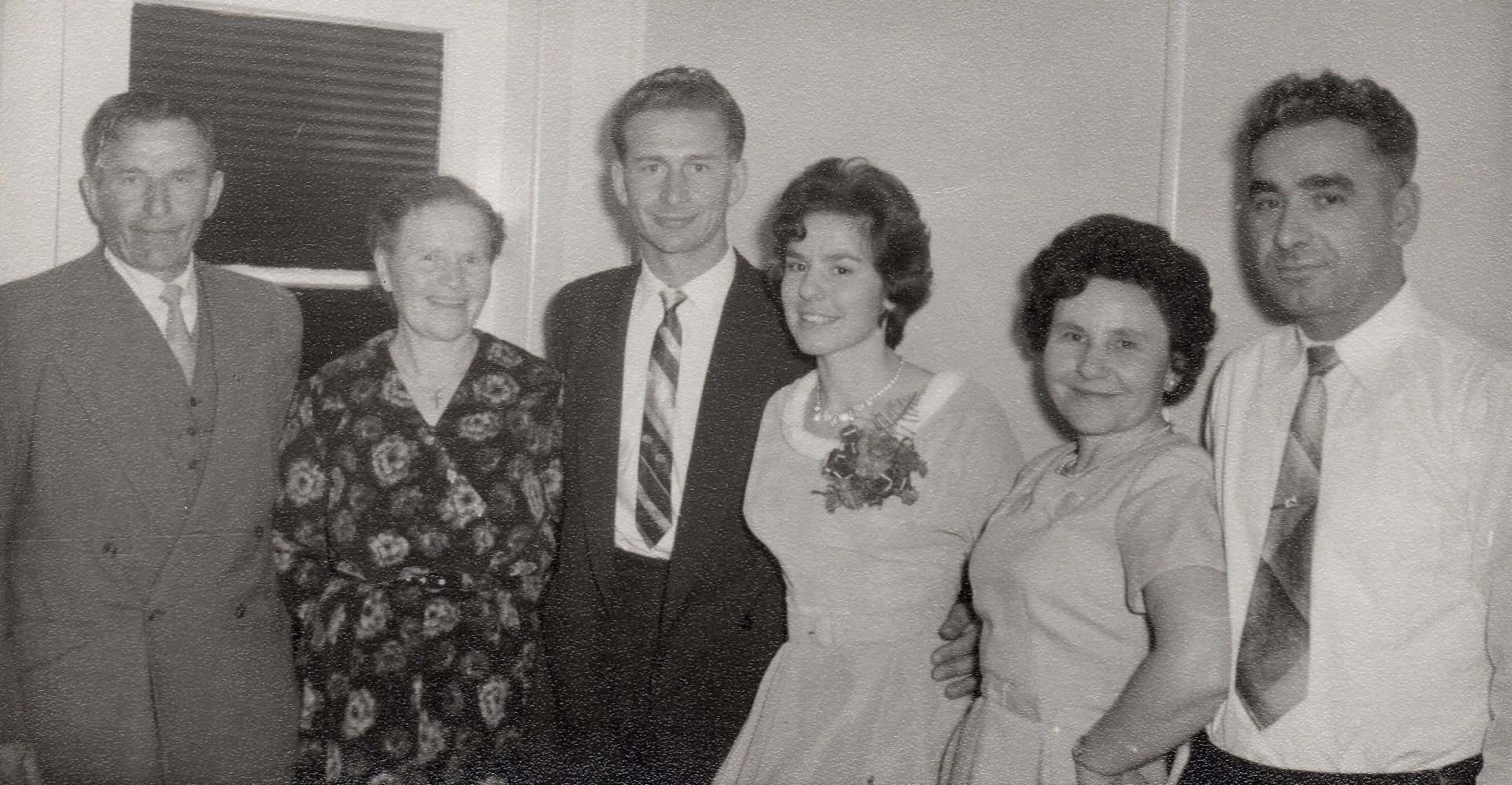 Black 
and white pic of Zenona and Michał between their parents of either side. All are smiling and Zenona's mother has her hand of 
her hip. Zenona and Emilja are in light-coloured dresses and Michał and his father in suits. Zofia is wearing a flowered 
dress and Jozef Cyckoma has his jacket off.