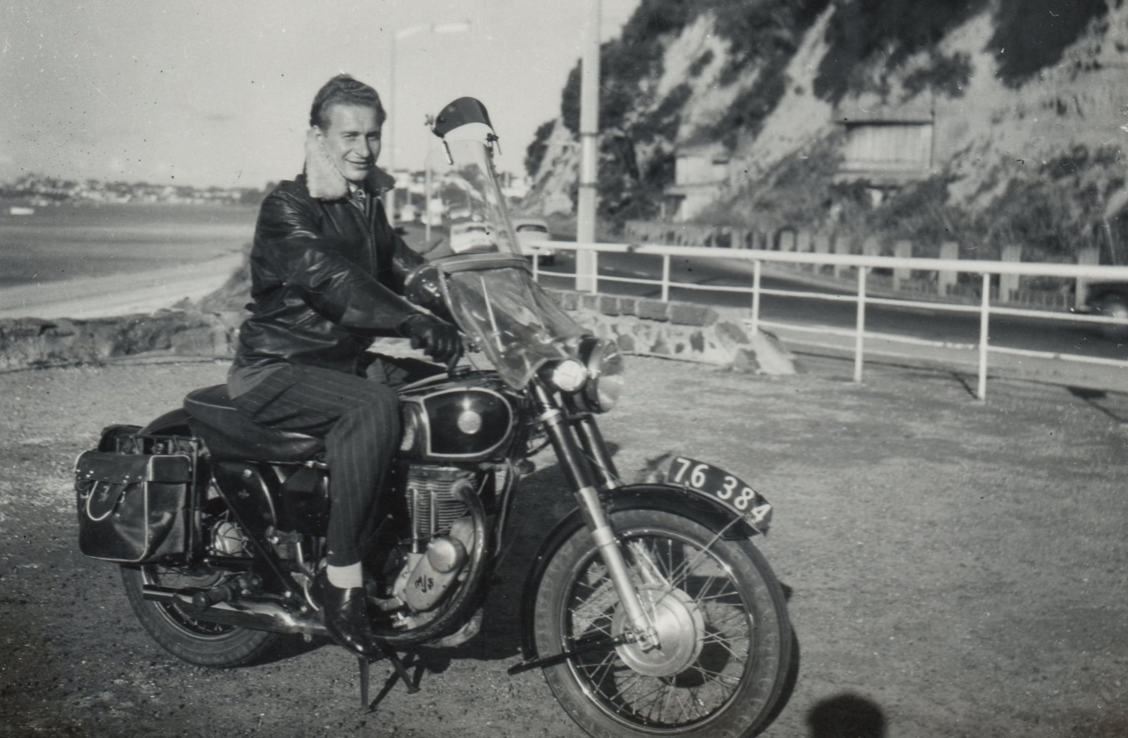 Michał sitting on 
his motorbike at the Tamaki Drive end of Mission Bay