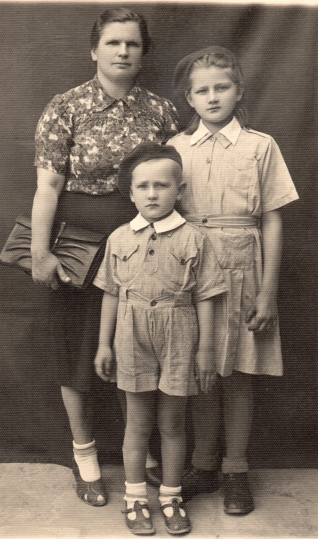 A studio pic of 
Mrs Budzyń with Zofia and Victor.