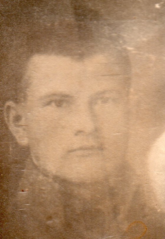 Head shot sepia 
pic of Wojciech Pleciak in army uniform