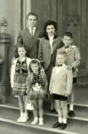 Ginter and Ula Poczwa 
with their four children on church steps