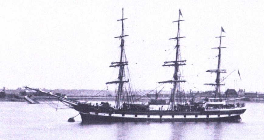 The Orari with her sails 
down, at anchor in a very still harbour